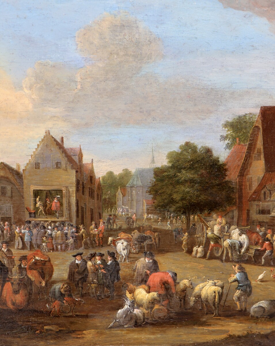 A cattle market, a theatre company performing in the background