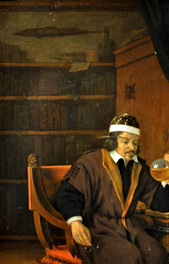 A doctor inspecting a flask of urine