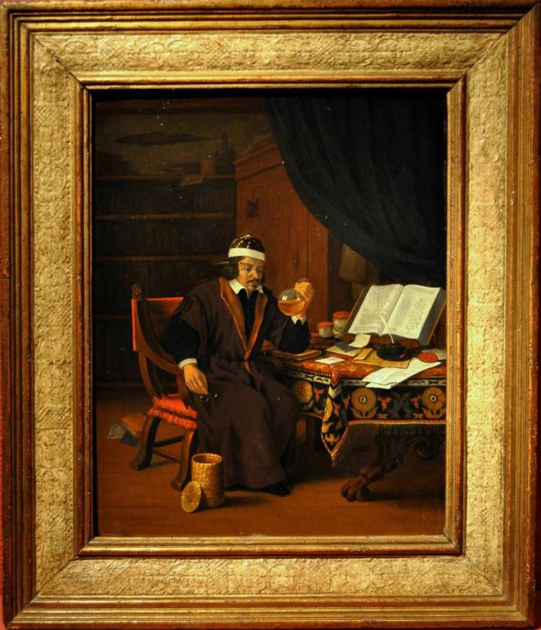 A doctor inspecting a flask of urine