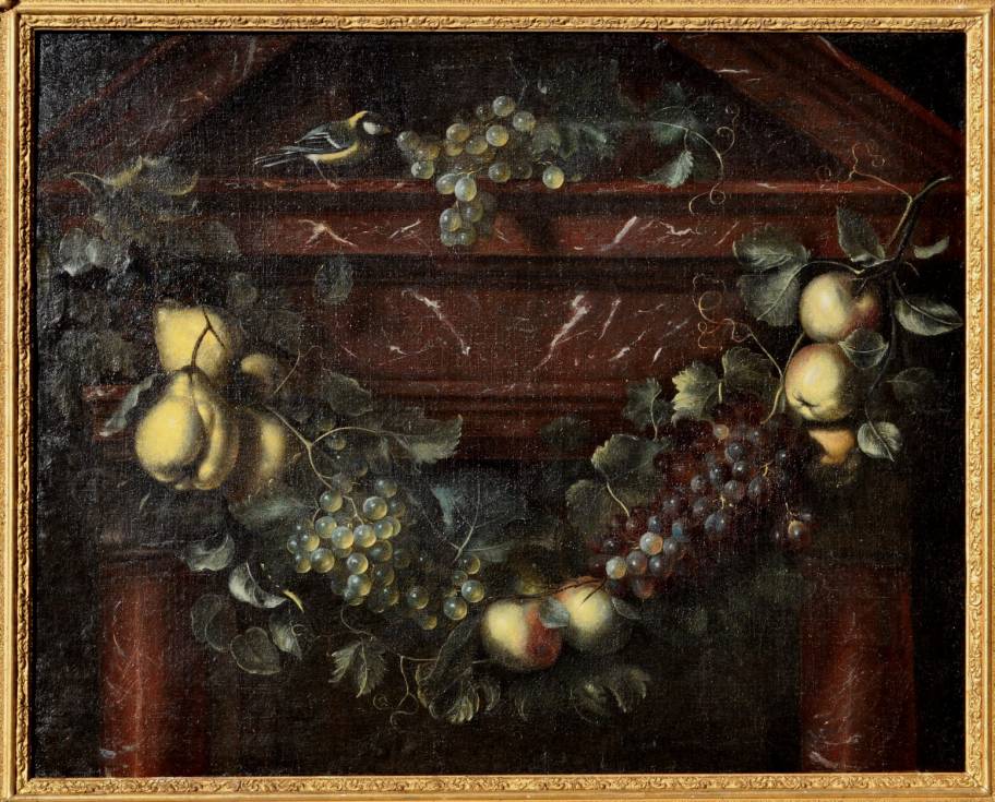 A swag of fruit against an architectural background