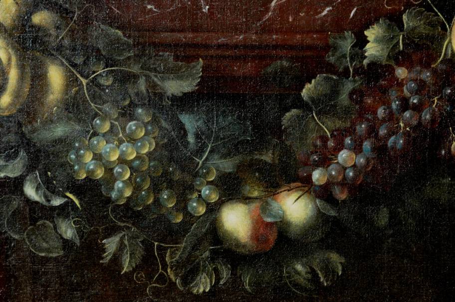 A swag of fruit against an architectural background