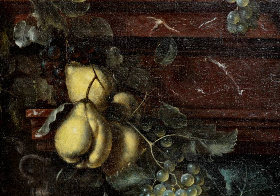 A swag of fruit against an architectural background