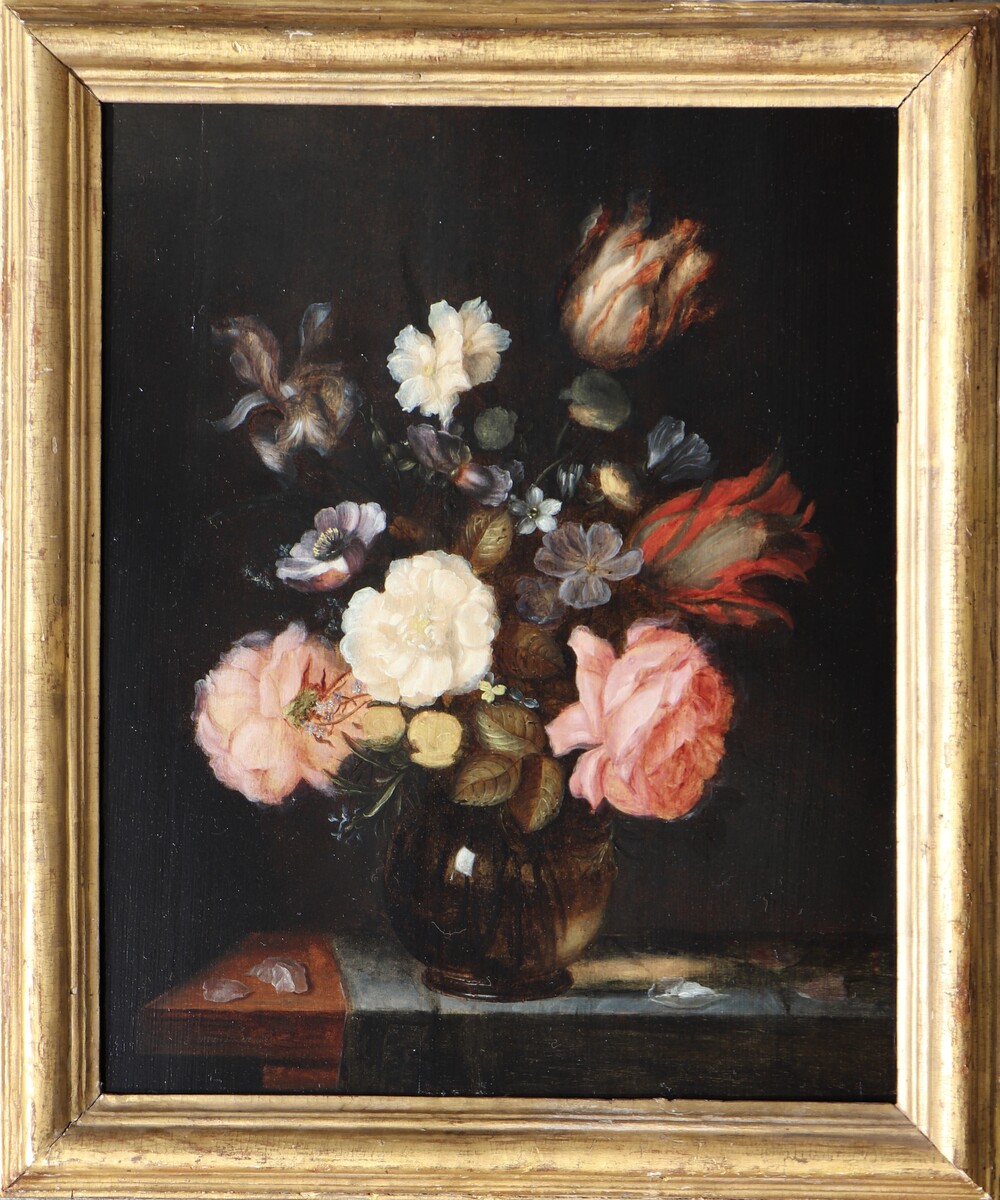 A bouquet of flowers in a glass vase