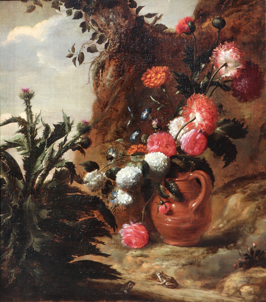 A forest floor with a thistle, a flowered jug and two frogs