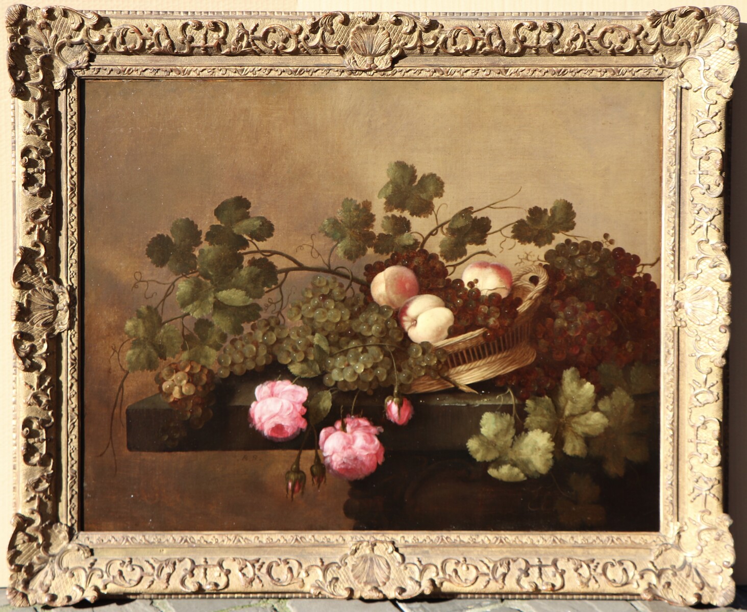 A fruit still life with roses