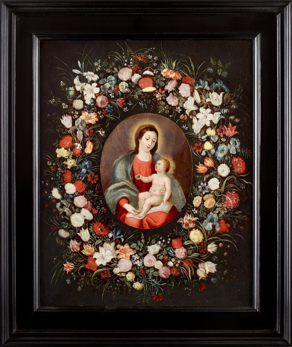 A garland of flowers surrounding the Virgin and Child