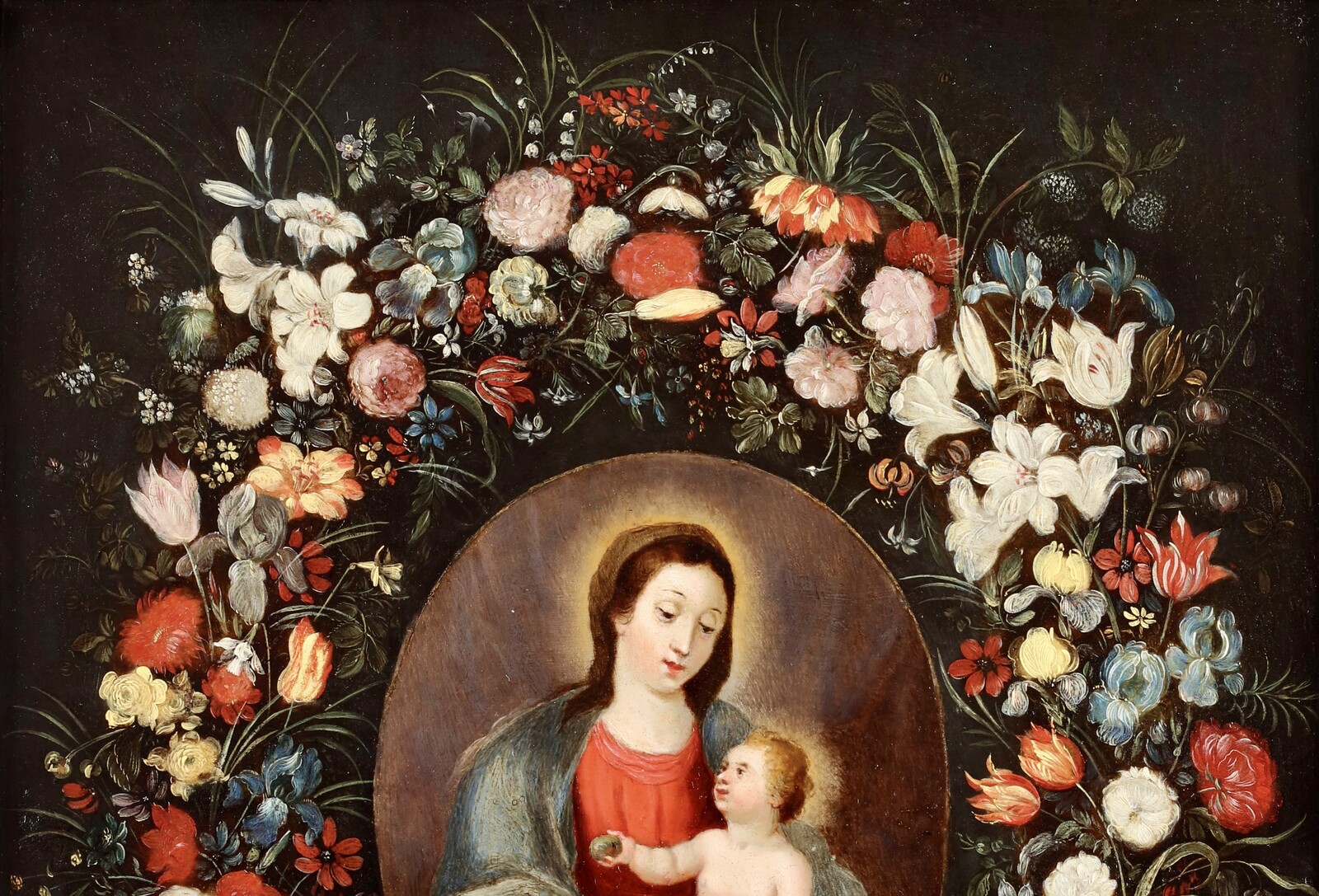 A garland of flowers surrounding the Virgin and Child