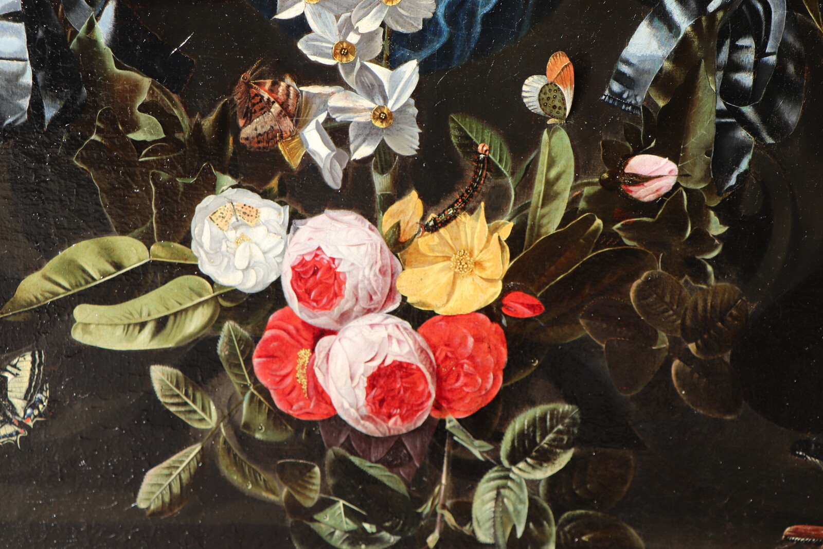 A garland of flowers with numerous insects surrounding the Virgin and Child with Saint Anne