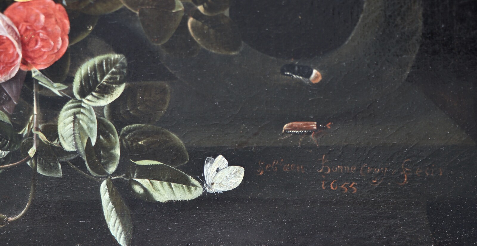 A garland of flowers with numerous insects surrounding the Virgin and Child with Saint Anne