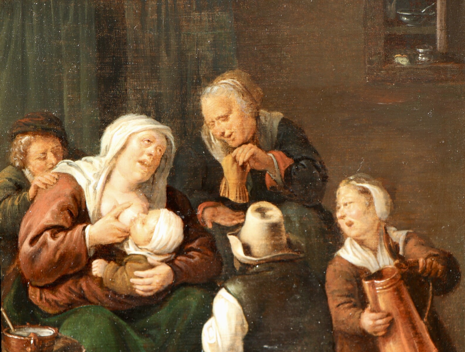 A mother breastfeeding a baby