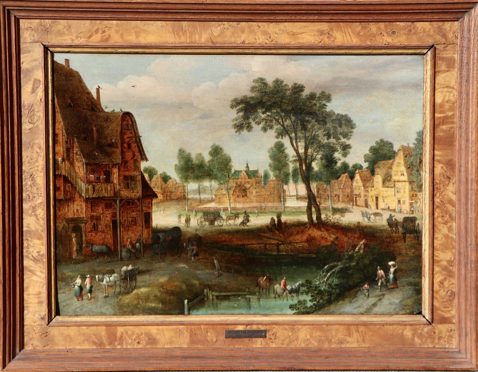 A village view with a watering hole