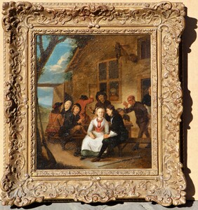 An elegant couple outside a tavern