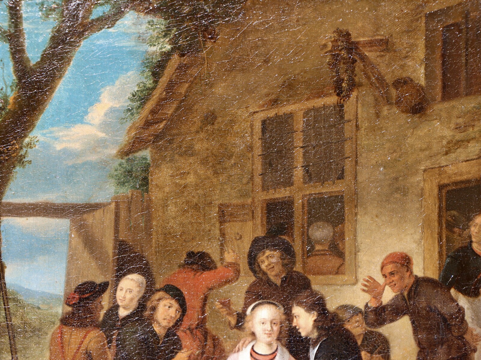 An elegant couple outside a tavern