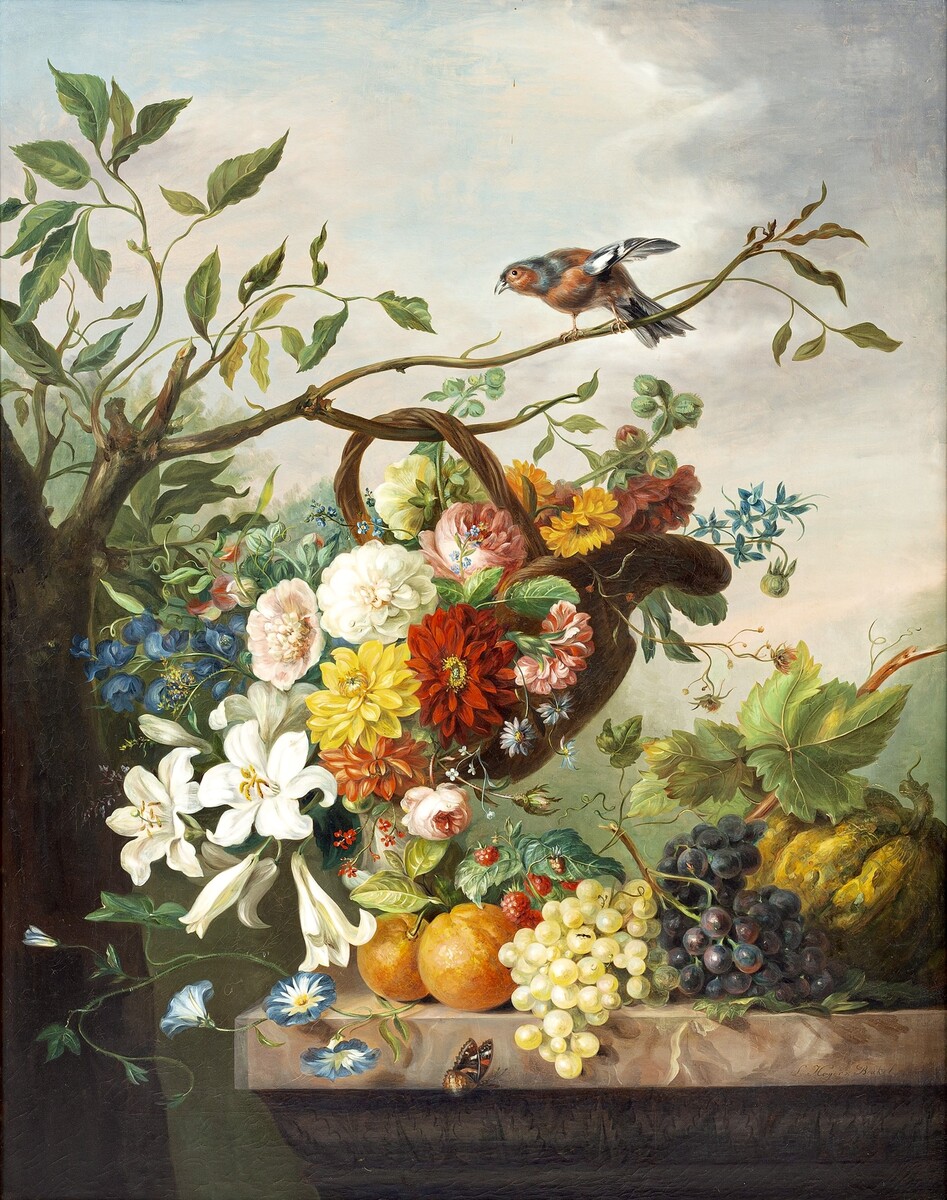 Flowers in a basket and fruit on a stone ledge