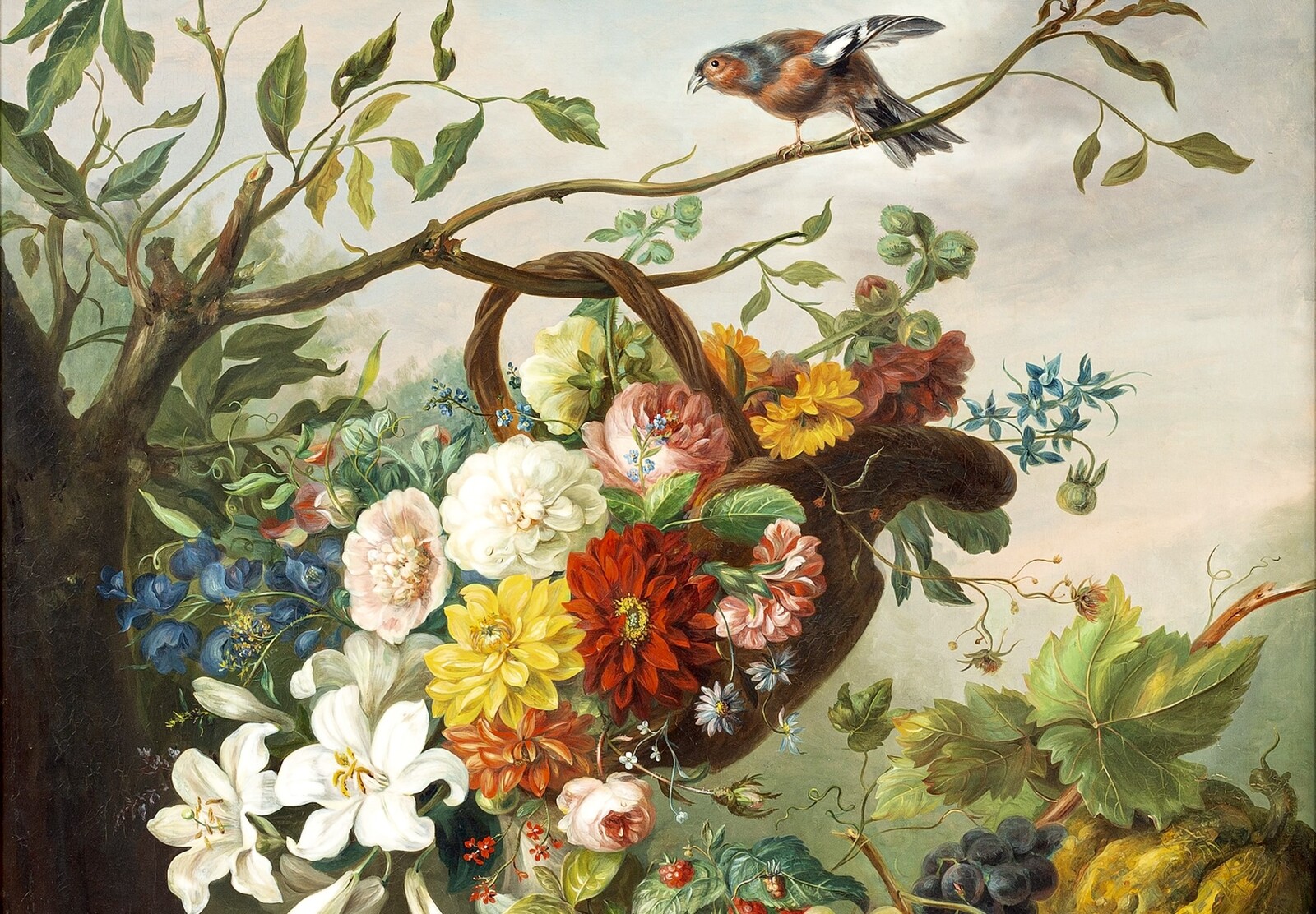 Flowers in a basket and fruit on a stone ledge