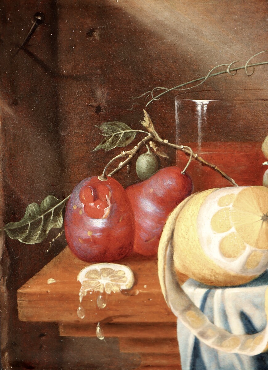 Fruit still life on a partly draped table