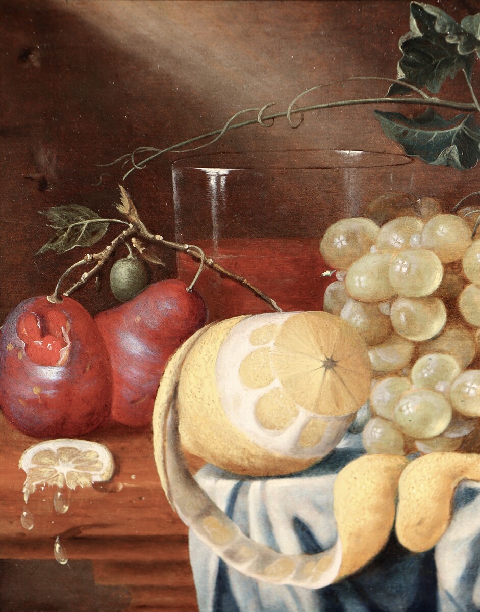 Fruit still life on a partly draped table