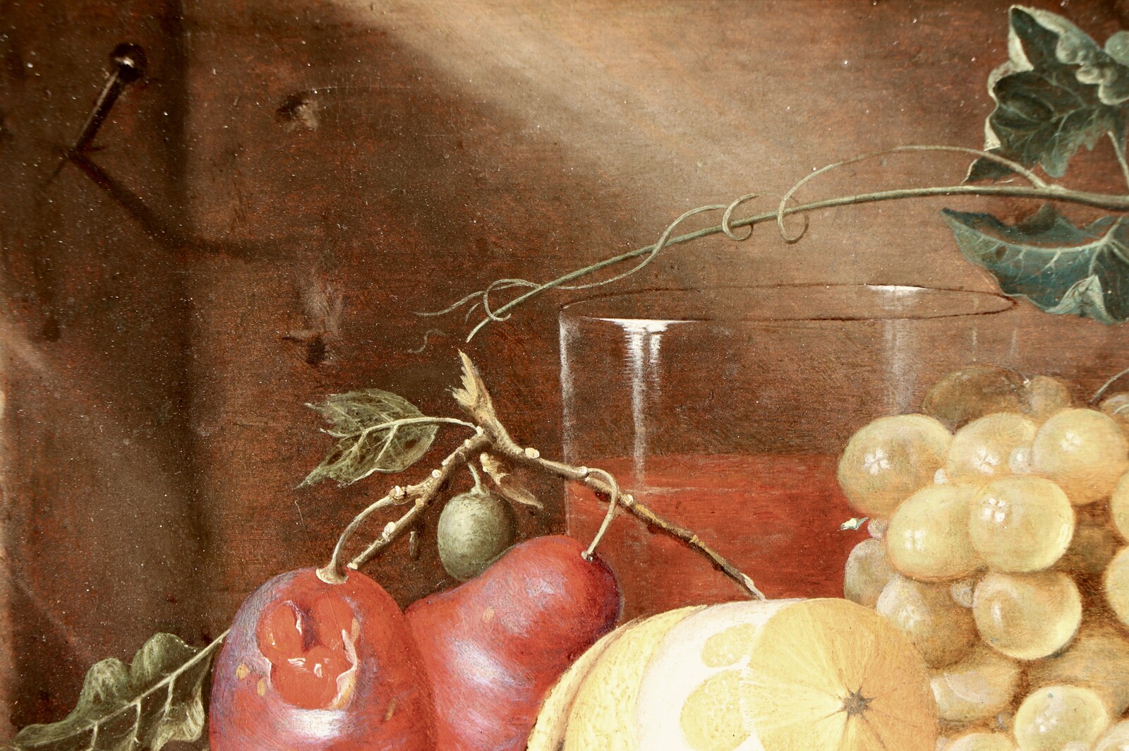 Fruit still life on a partly draped table