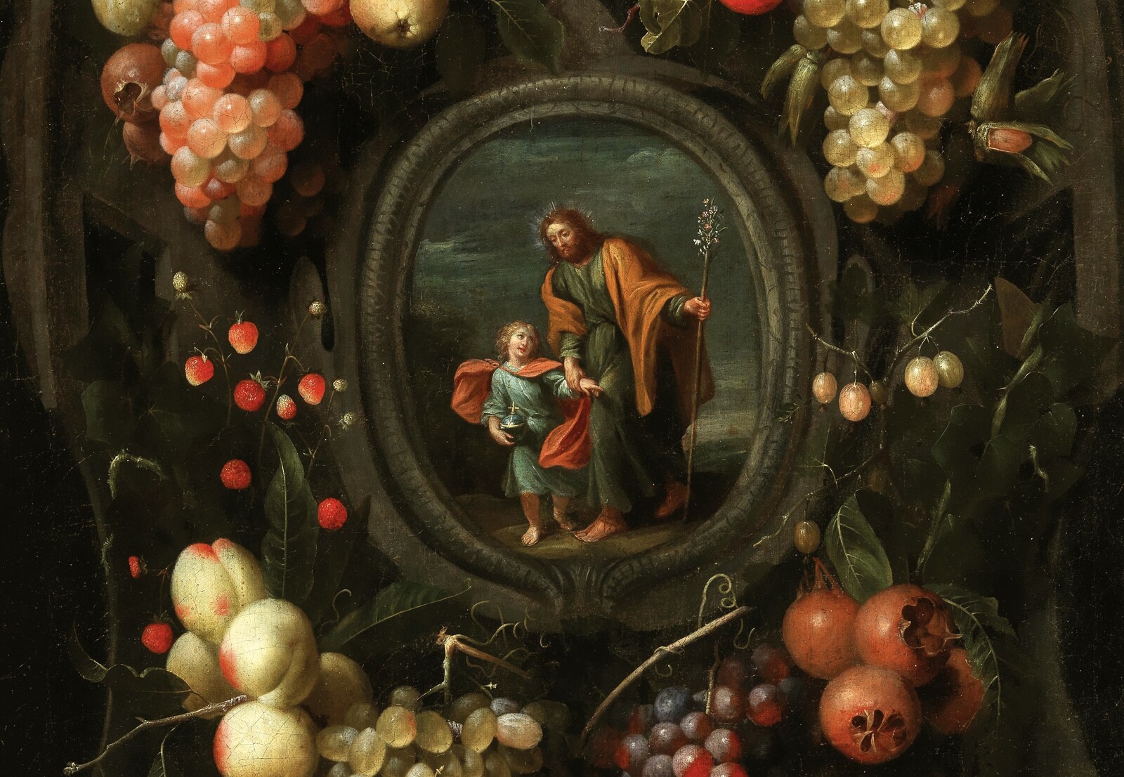 Garlands of fruit adorning a stone cartouche with Joseph and the Christ Child