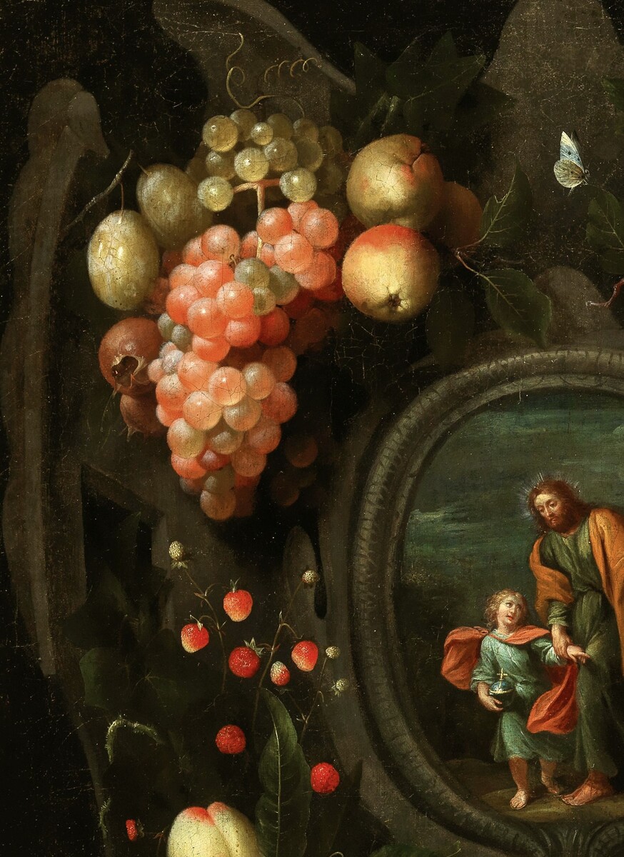 Garlands of fruit adorning a stone cartouche with Joseph and the Christ Child