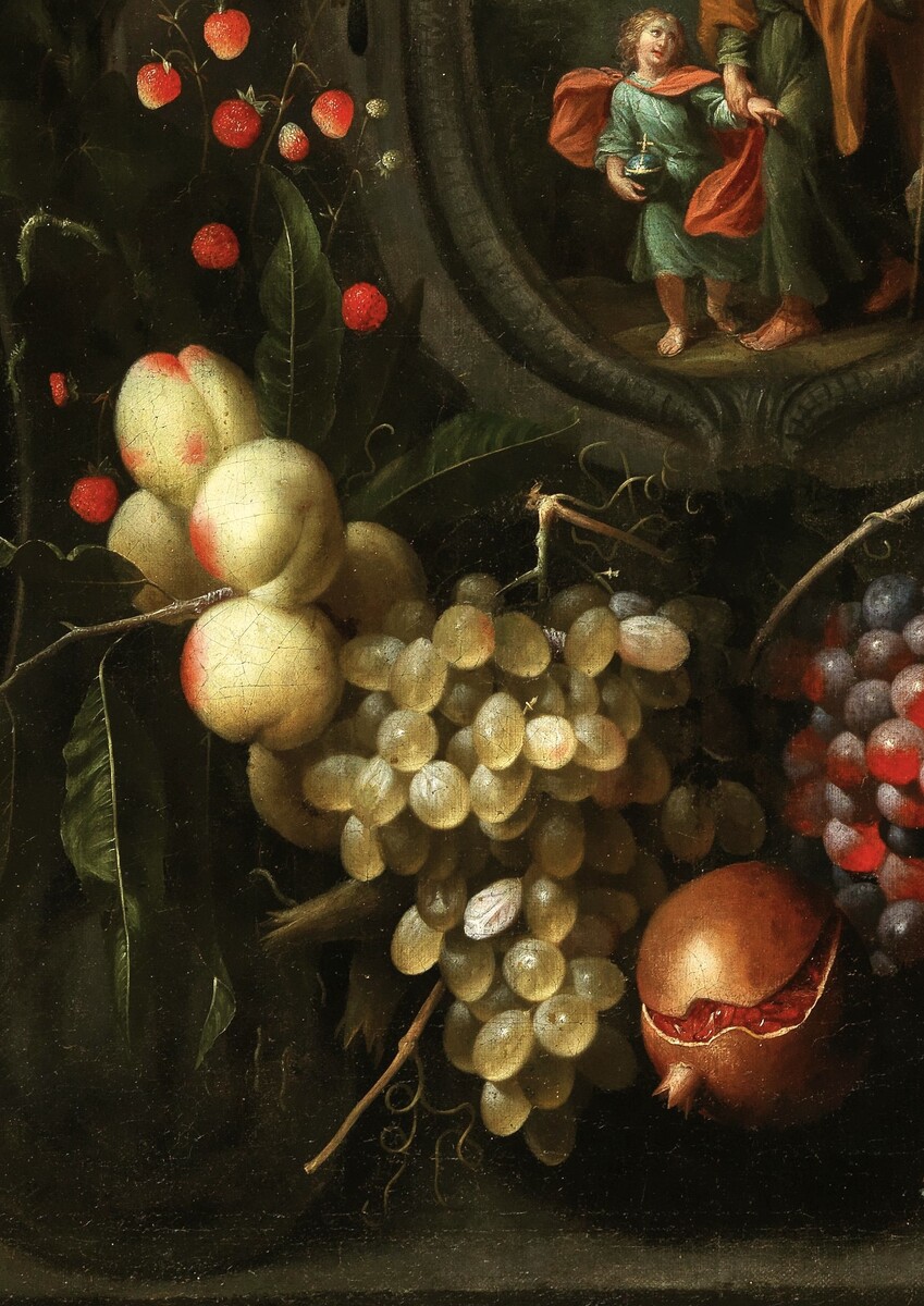 Garlands of fruit adorning a stone cartouche with Joseph and the Christ Child