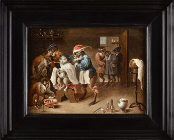 Monkey-trick with a cat at the monkey-barber