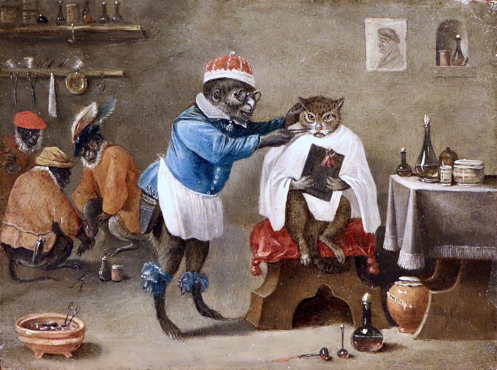 Monkey-trick with a cat at the monkey-barber