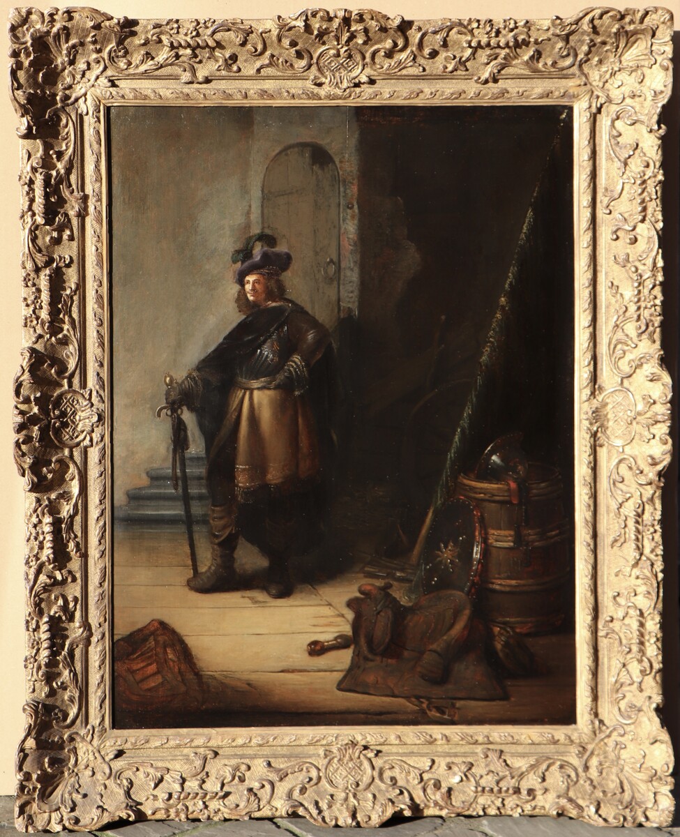 Officer in an interior with a still life of weapons
