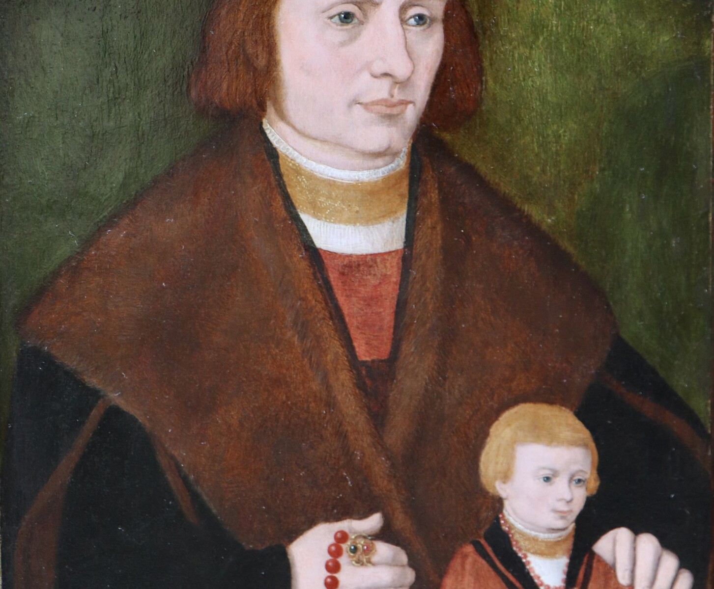 Portrait of a wealthy man and his young son
