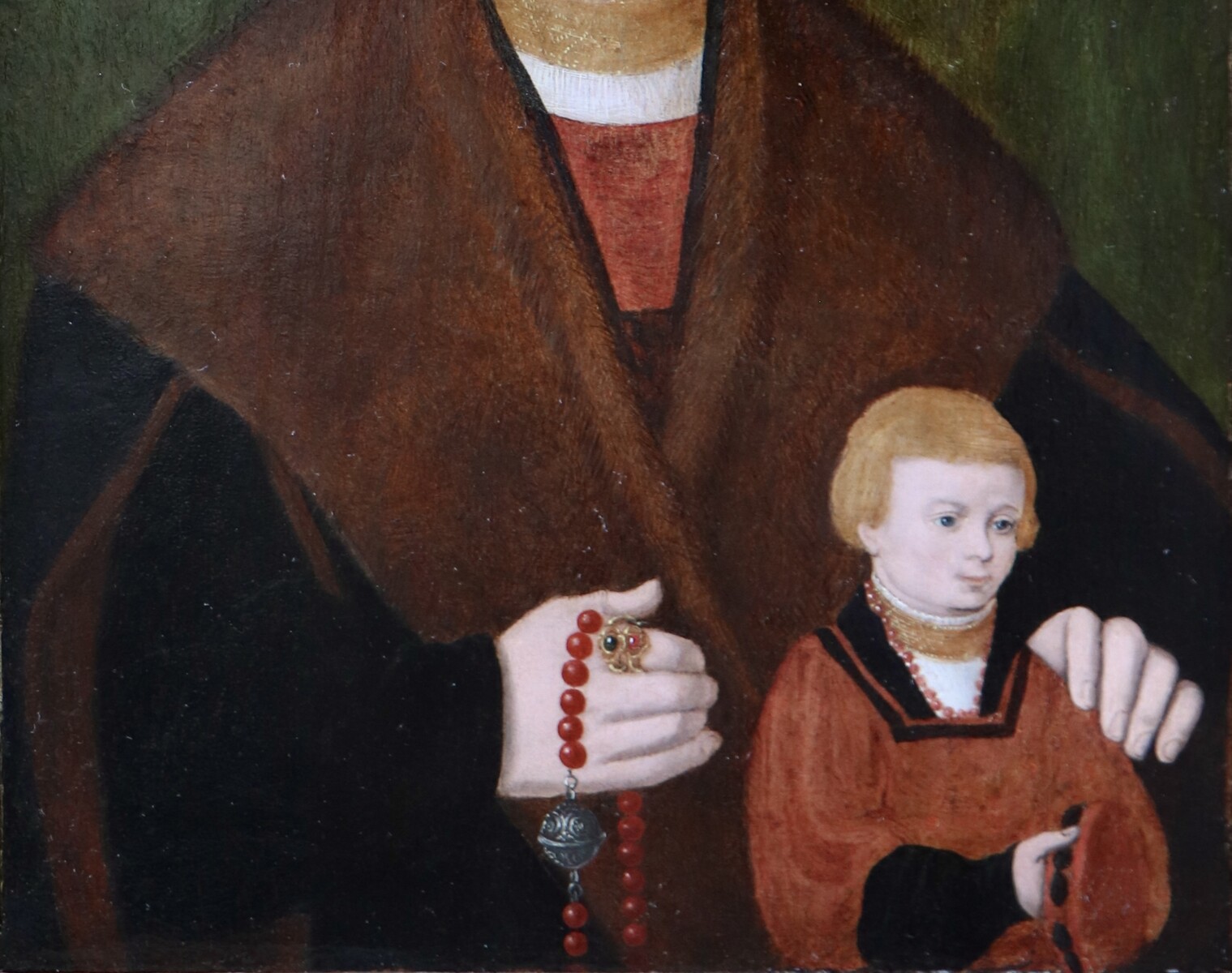 Portrait of a wealthy man and his young son