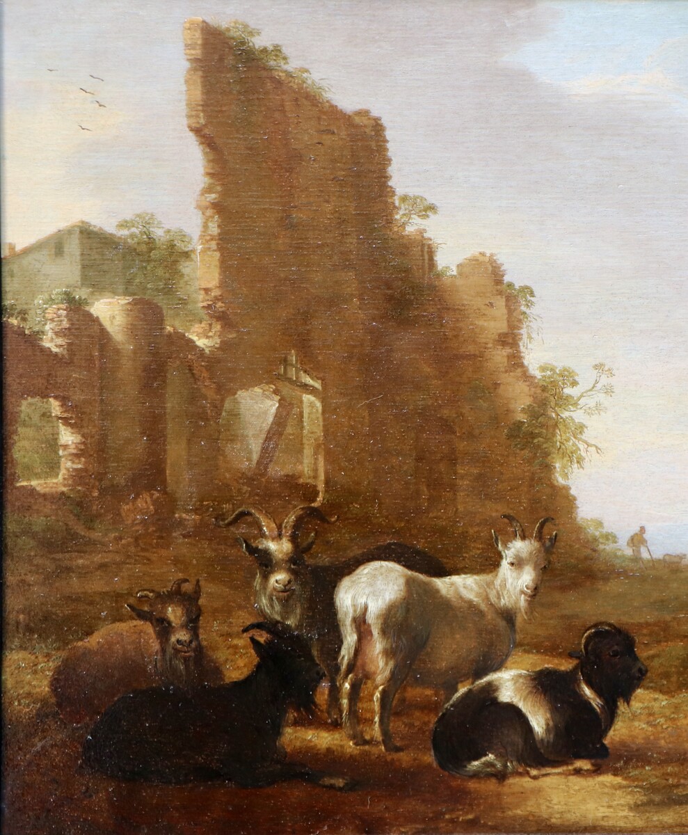 Shepherds with their goats in an Italianate landscape