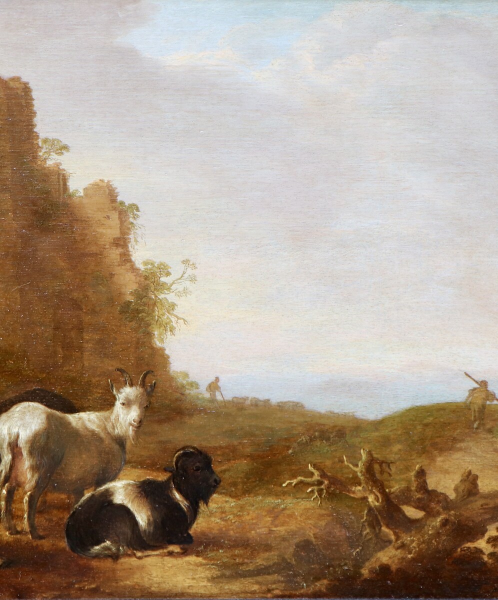 Shepherds with their goats in an Italianate landscape