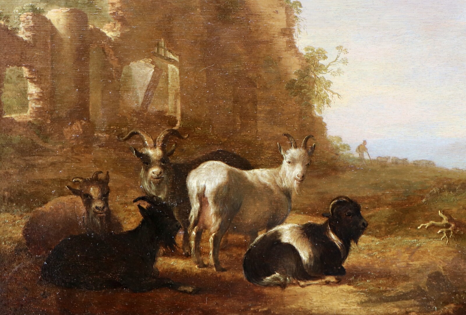 Shepherds with their goats in an Italianate landscape