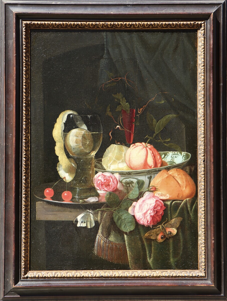Still life with a peeled lemon in a Roemer glass