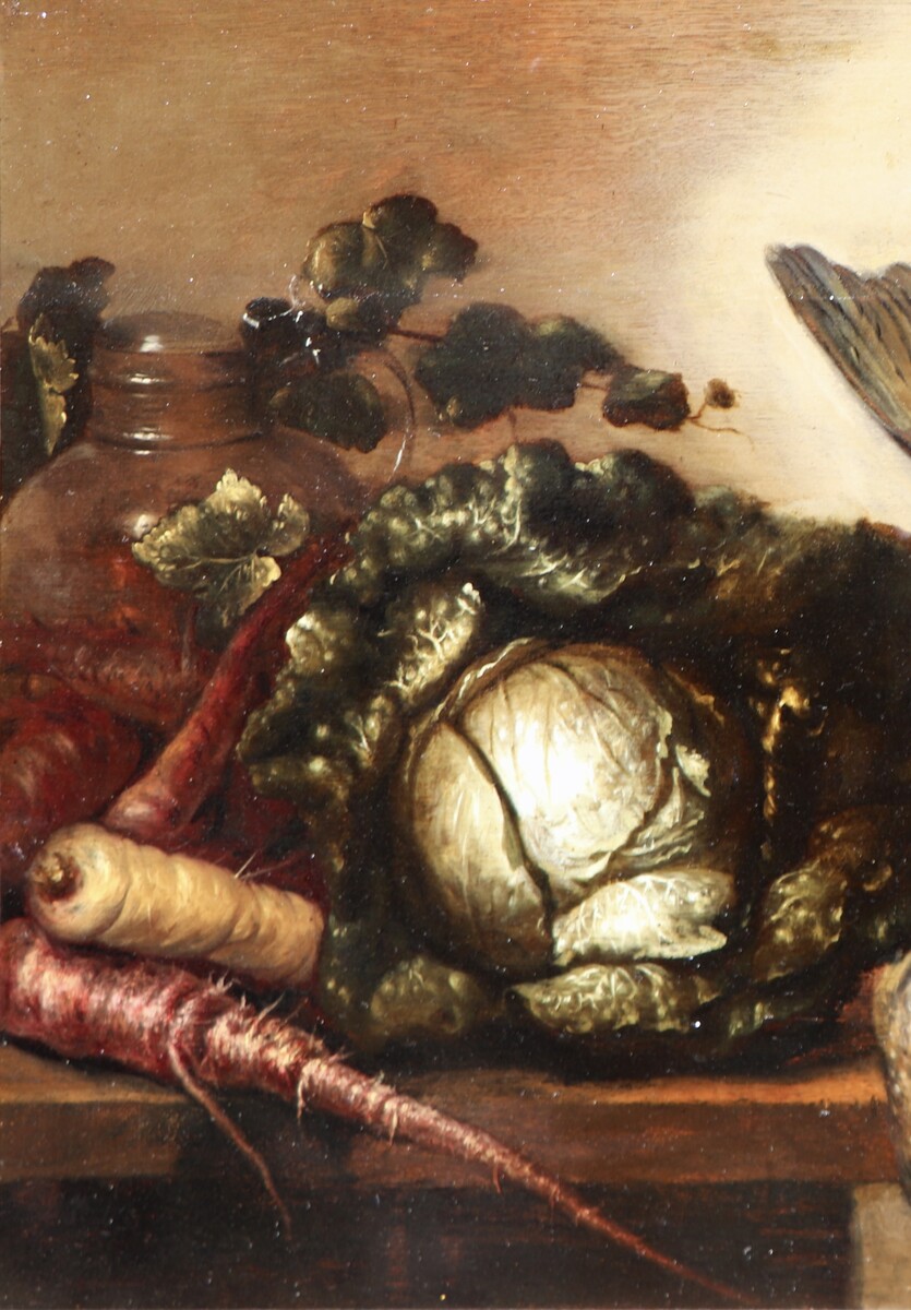Still life with dead game, a pitcher and vegetables