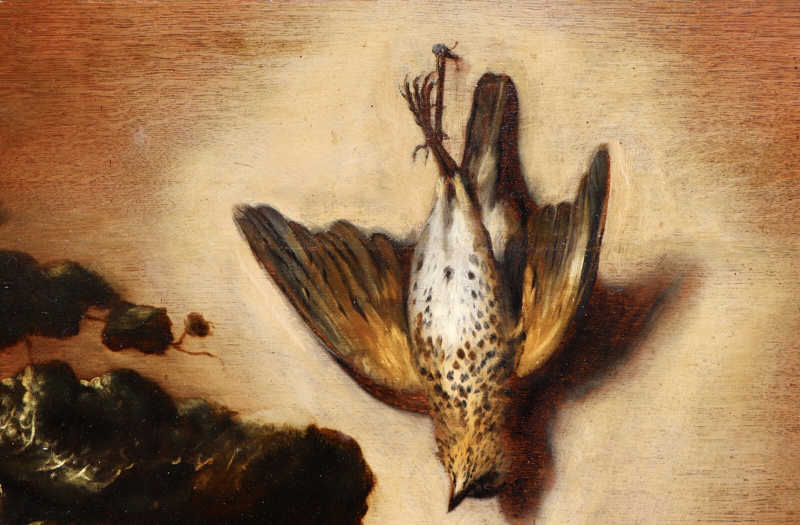 Still life with dead game, a pitcher and vegetables